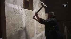 Still from ISIL video of destruction of Nimrud; Aljazeera; April 2015
